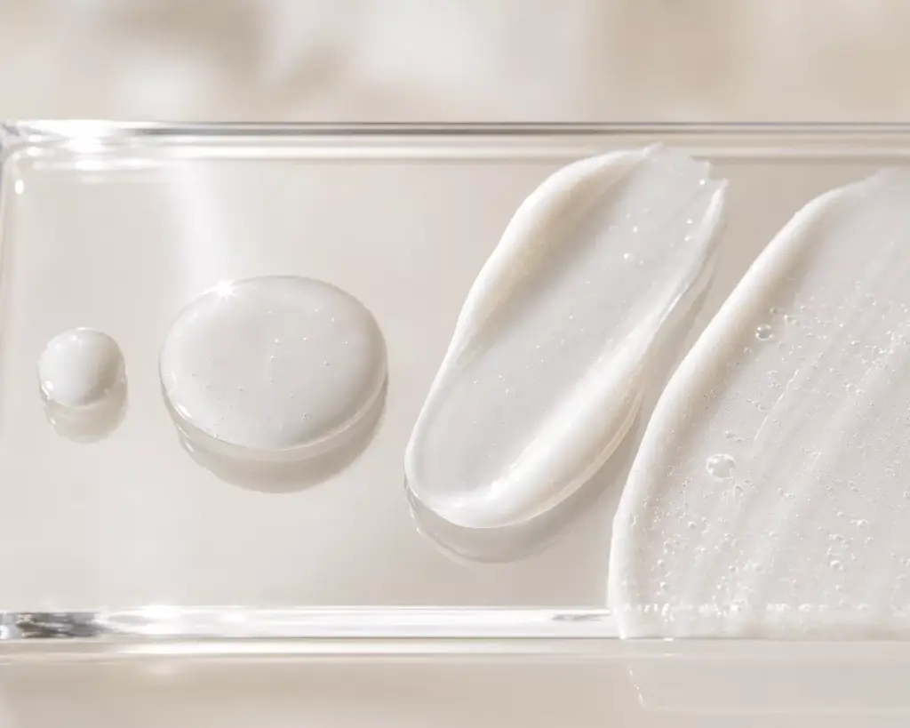 The Glazed Milk Skin Trend: The Science of Layering K-Beauty Milky Toners for Radiant Skin 3 A macro shot of luxurious milky skincare droplets demonstrating the formulation for achieving glazed milk skin.